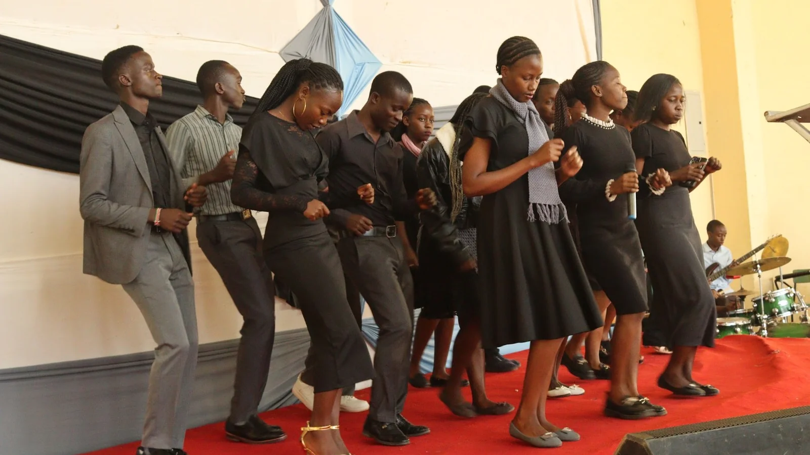 MMUST CU Music Ministry leading worship on stage